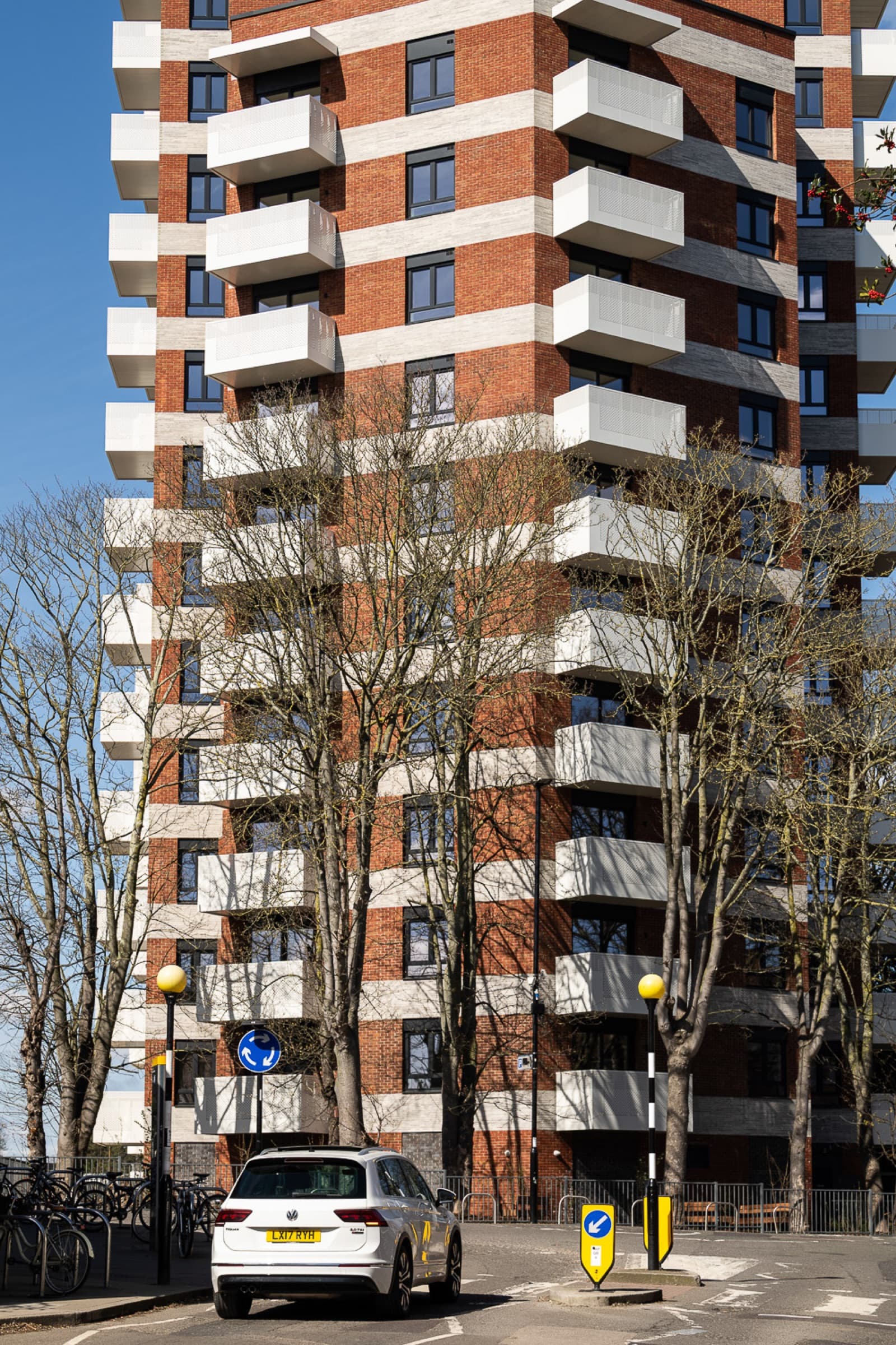 Exterior of Brooke House, Acton, showing the brick facade and balconies
