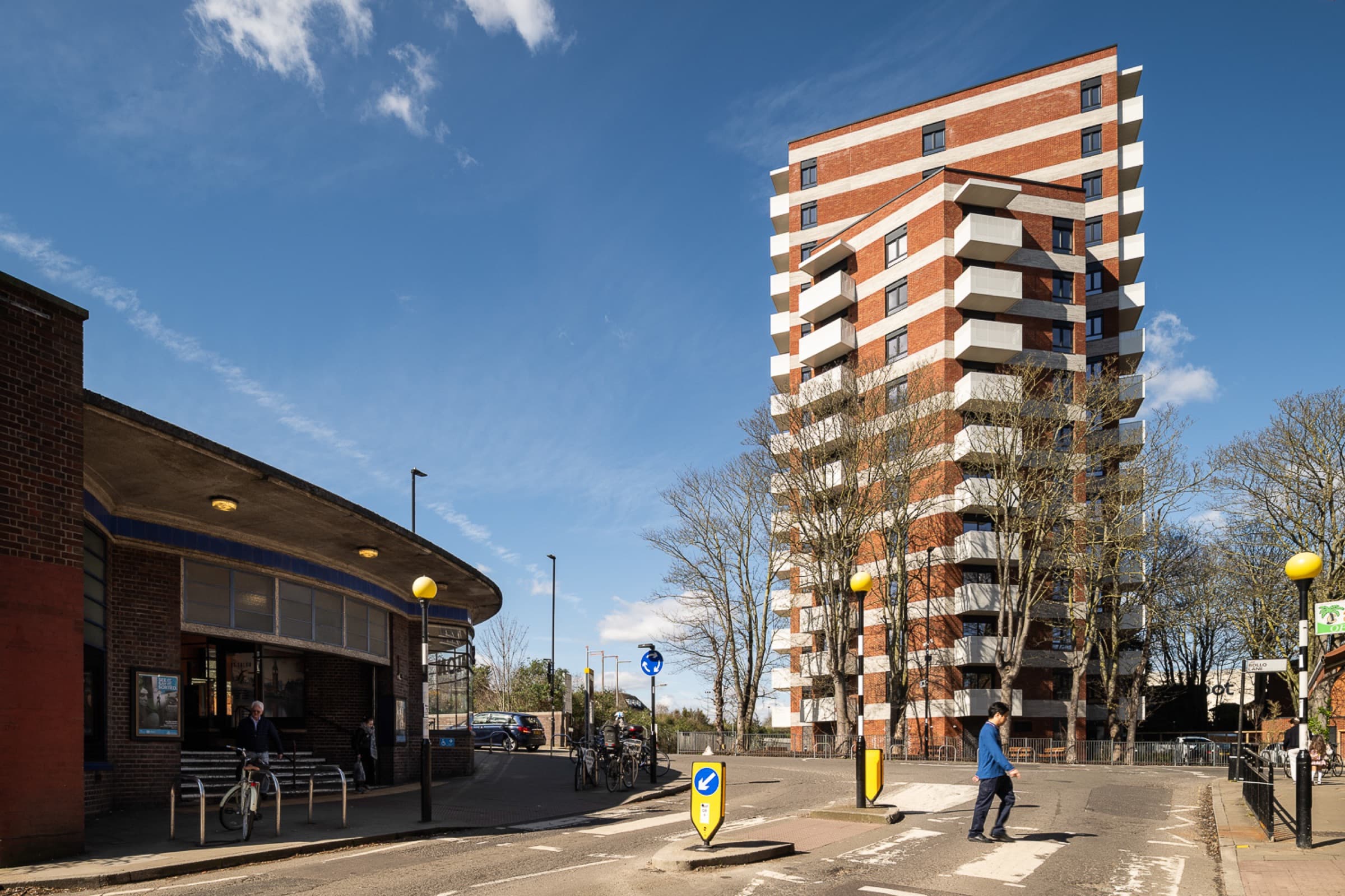 Brooke House, Acton — completed 15-storey tower with red brick and white banding beside Acton Town station